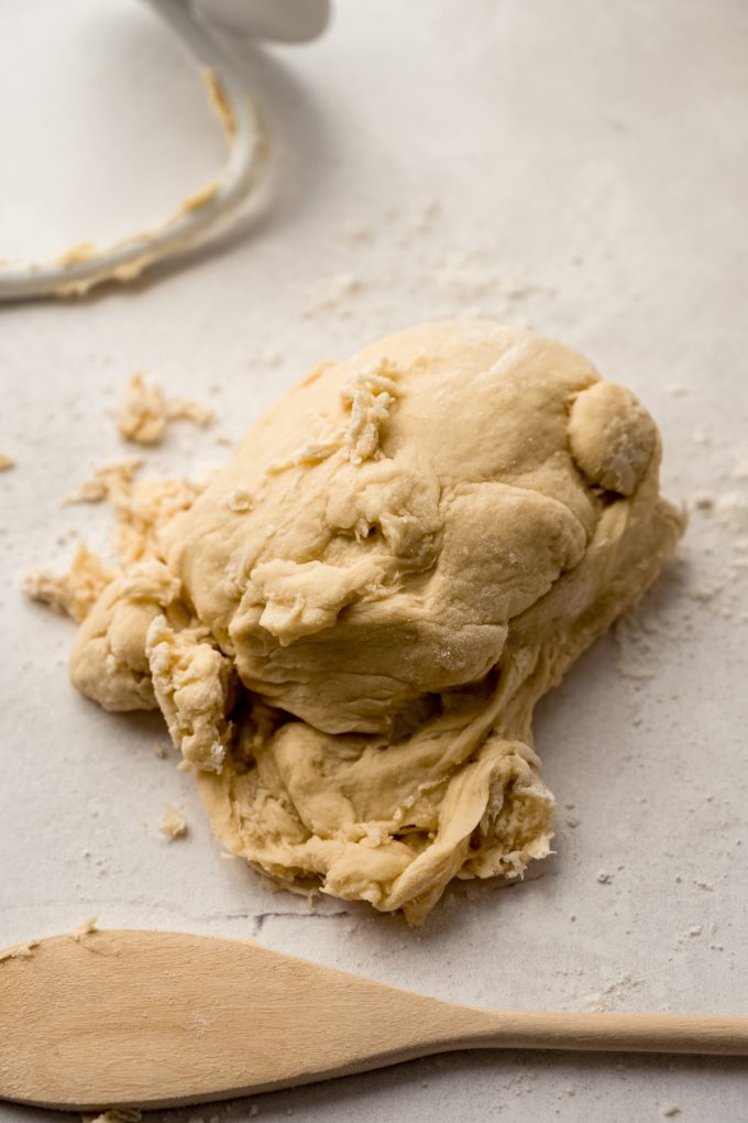 Yeast dough on a surface before kneading.