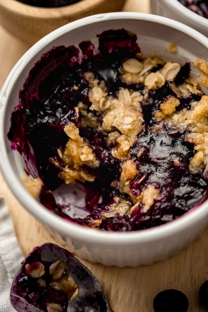 Blueberry crisp in a ramekin.