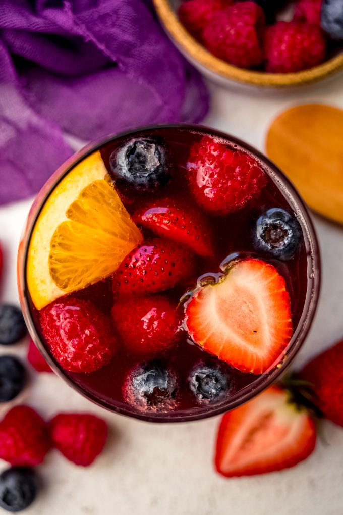 Aerial photo of a glass of berry sangria.