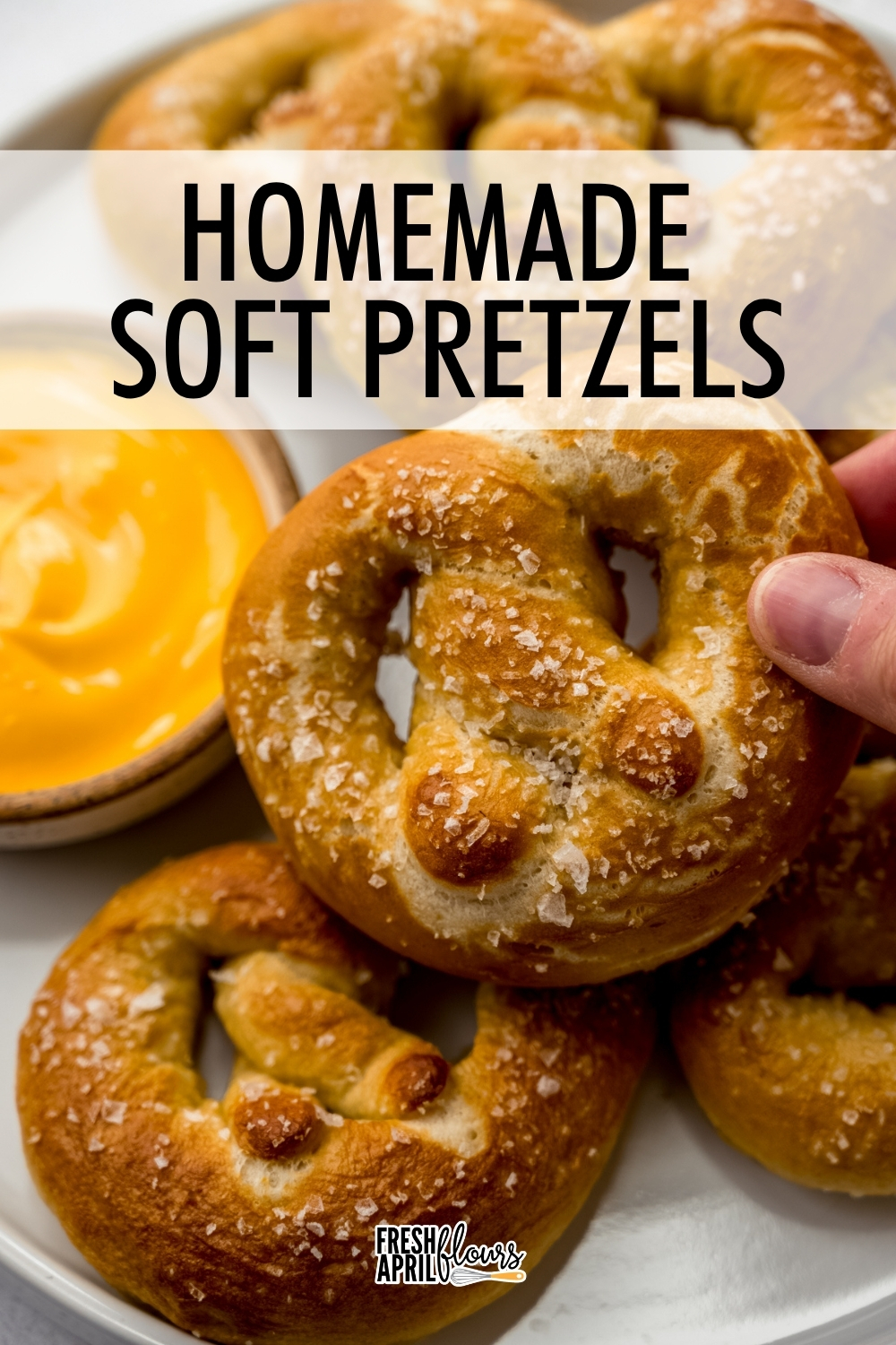 Soft and delicious homemade soft pretzels are easier to make than you think! The simple yeasted dough rests for just 10 minutes before shaping, and a quick baking soda boil is key to delivering that traditional pretzel flavor you're craving, no special equipment or skills required. via @frshaprilflours
