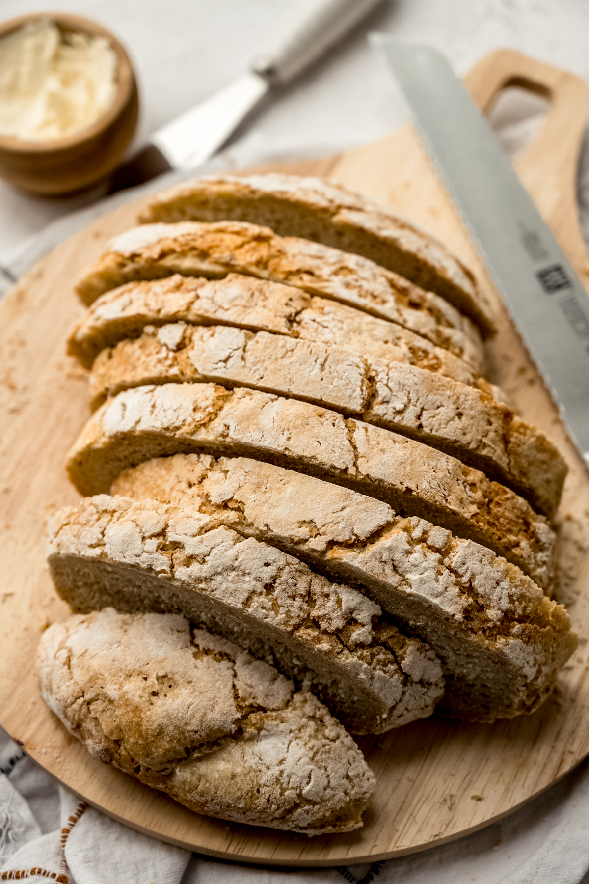 Sliced no knead bread on a surface.